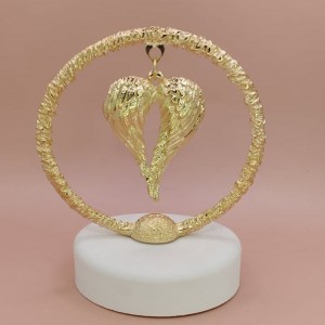 Μπομπονιέρα φτερά αγγέλου σε κύκλο Μπομπονιέρα φτερά αγγέλου σε κύκλο