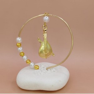 Μπομπονιέρα κρητική λίρα σε πέτρα Μπομπονιέρα κρητική λίρα σε πέτρα